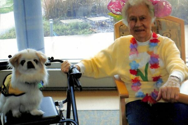 Sister Paschal with the visiting dog Casper on Halloween in 2009 at the Marywood Health Center.