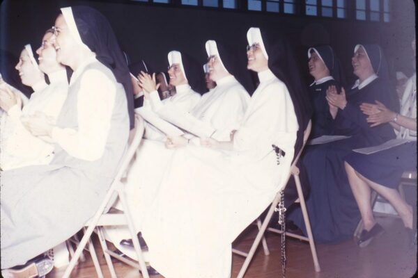 Sr. Maria Tardani (far left) with Srs. Marie Kathleen McCrackin and Rose Mary Belanger at a program at St. Paul's Seminary.