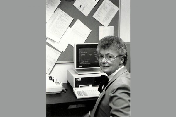 Working at a computer sometime after 1973.