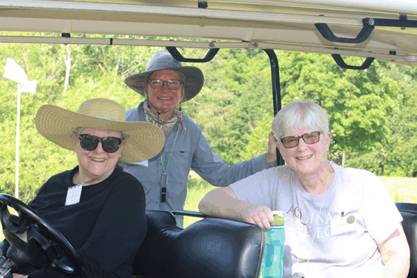 Sr. Phyllis Supancheck, Landscaper Rebecca Marquardt, and Kathi Sleziak tour the Prairie at Marywood in Grand Rapids.