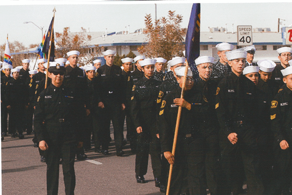 Sr Eileen Jaramillo,, 2009, Veterans Day Parade accompanying her freshman students in New Mexico.