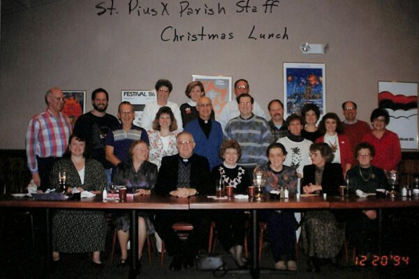 Sister Verona pictured in the bottom right with the parish staff of St. Pius X Parish in Grandville, Michigan for the Christmas lunch of 1994