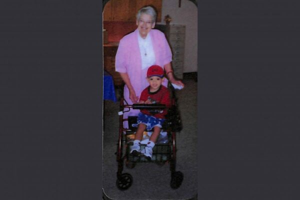 Giving a buddy a ride on her walker