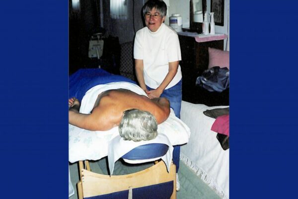 Sister Roxanne giving a massage in Bay City after graduating from a school of massage