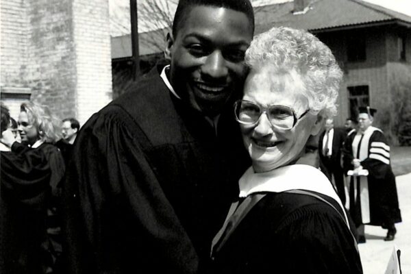 Celebrating with an Aquinas College graduate