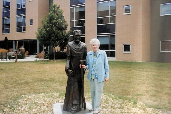 Sister Ann with Saint Dominic statue in from of the Marywood Health Center in 2008