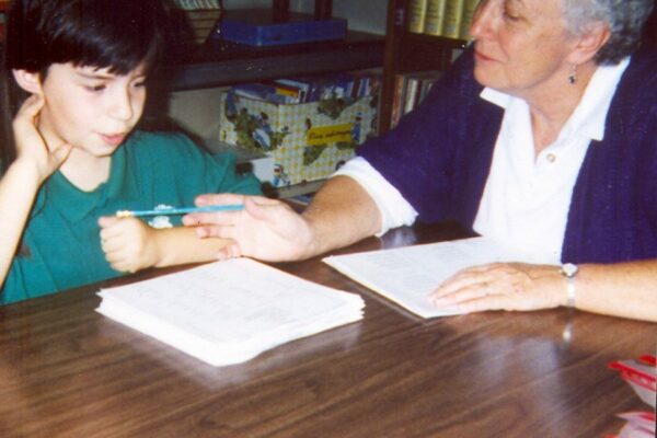 Sister Mary Louise Stauder teaches a student at the Grandville Avenue Library in Grand Rapids, Mich., through the Grand Rapids Public Schools family literacy program.