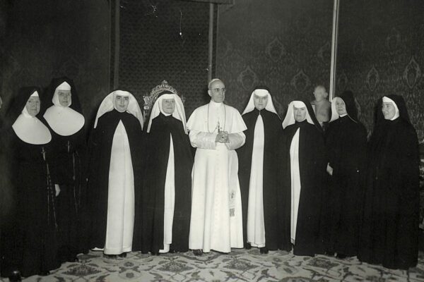 Sister Lois pictured to the right of Pope Pius XII while she was studying in Rome