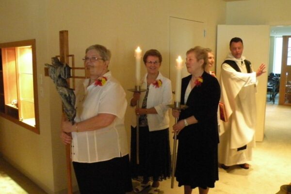 Sister Marie Carla Moeggenborg during liturgy in Dominican Chapel at Marywood. Also pictured are Sisters Jean Karen Woloszyk, Joellen Barkwell, and Mary Ann Barrett.