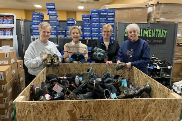 Volunteering at the Store House, a source of new donated shoes and clothing, and household and school supplies. Sr. Carmen Rostar, Sr Doris Faber, Sr. Jarrett DeWyse, Sr. Joellen Barkwell
