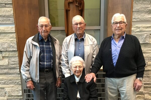 Sr Aquinas Weber with three brothers 2019