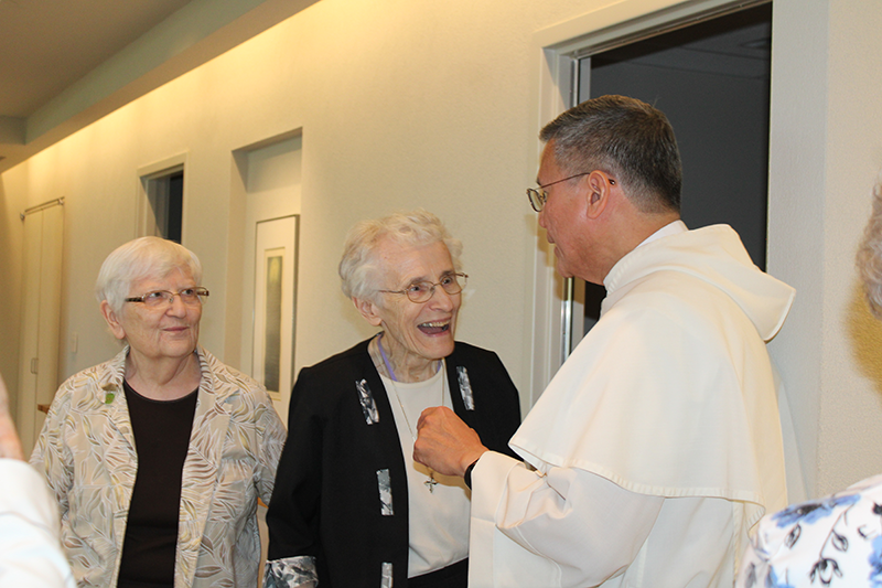 Sr. Catherine Williams OP and Sr. Joyce Ann Hertzig visit with Fr. Gerard Timoner OP.