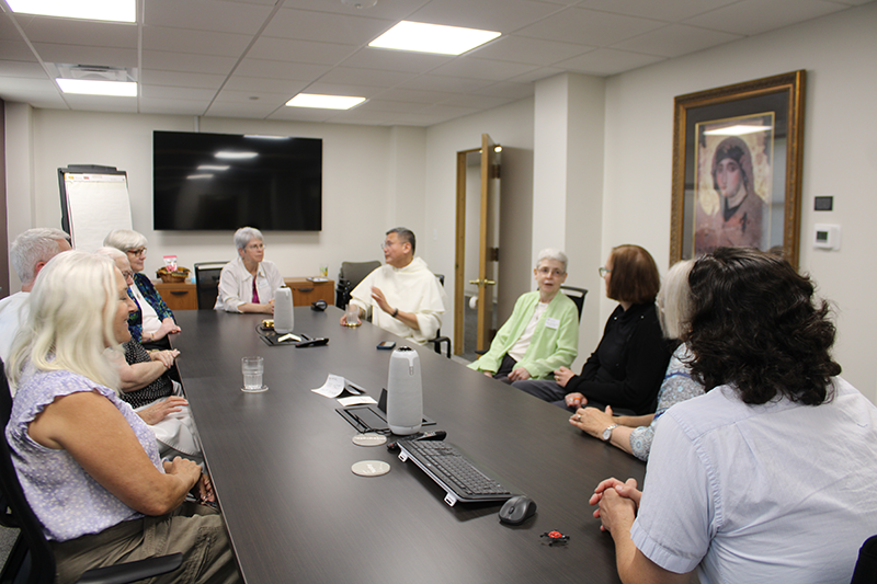 The Leadership Team and Campus Directors meet with Fr. Gerard Timoner OP and Fr. Louie Morrone OP in Veritas Hall.