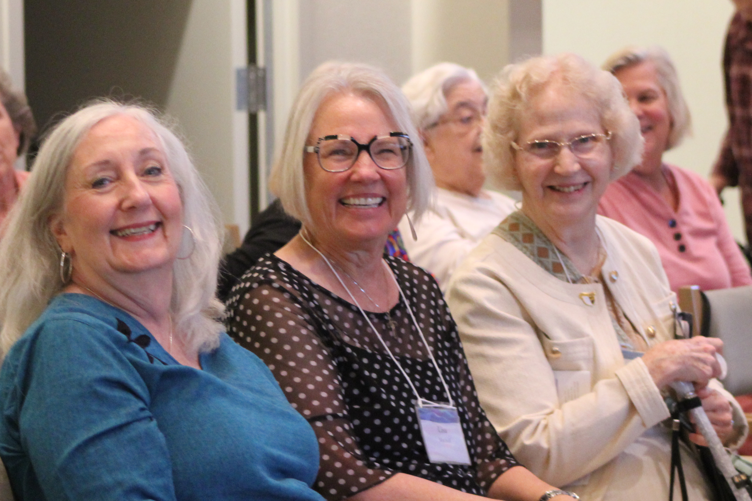 Associates Terri Sierzant, Lisa Mitchell, and Cassandra Kroondyk brough the JOY, JOY, JOY!